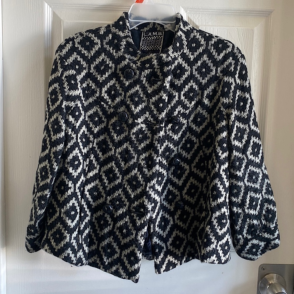New without tag. Never worn, I just kept it in the closet. 100% wool.